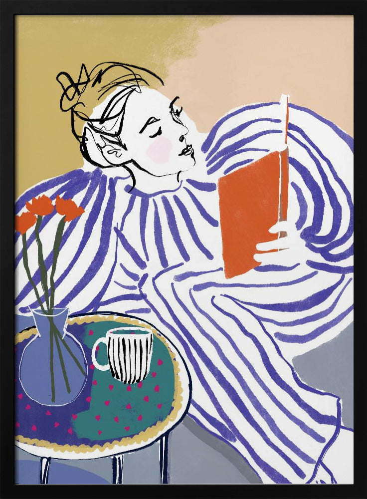 A stylized, framed illustration of a person with dark hair in a messy bun, wearing a blue and white striped top, reclining comfortably while engrossed in an orange book. Beside them is a small table with a blue vase holding three orange flowers and a black and white striped mug. The background is a soft beige color. Print