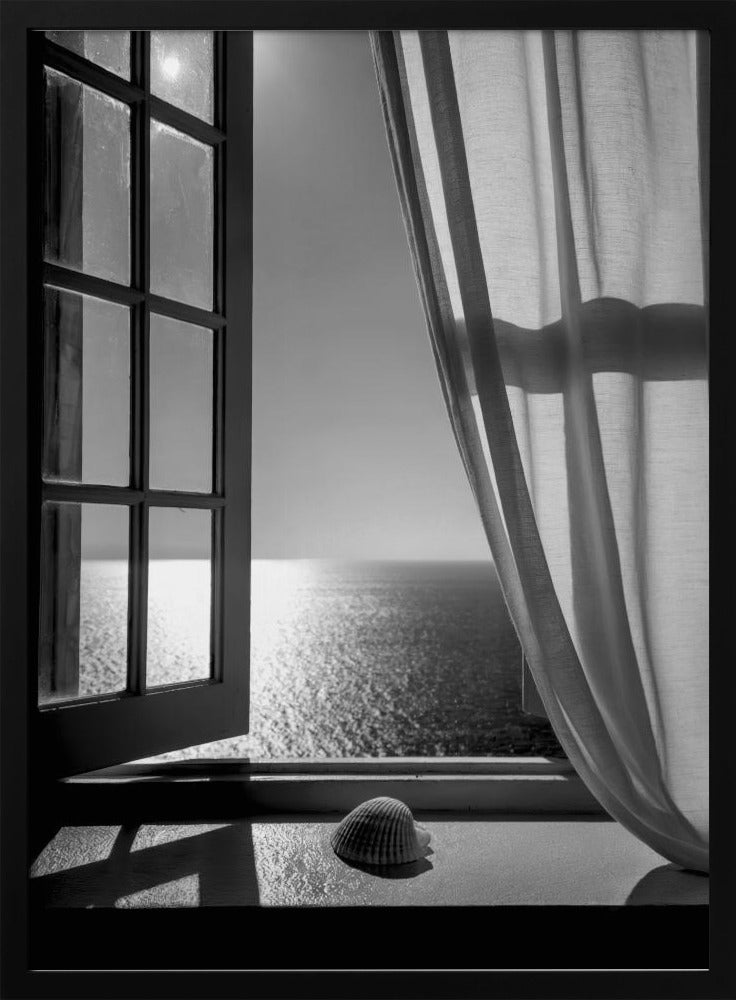 A serene black and white photograph looking out an open paned window at a sunlit ocean. A single seashell rests on the windowsill in the foreground, with shadows cast by the window frame. A light curtain hangs to the right, framing the tranquil sea view. Poster