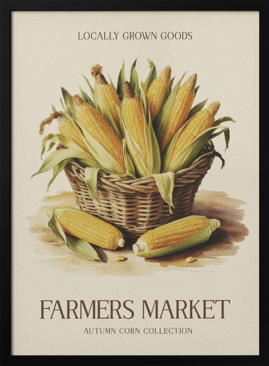 A vintage-style art print with a black frame featuring a wicker basket full of ears of corn. The poster has text that reads 'LOCALLY GROWN GOODS' at the top and 'FARMERS MARKET AUTUMN CORN COLLECTION' at the bottom. The background is a light cream color. Artwork
