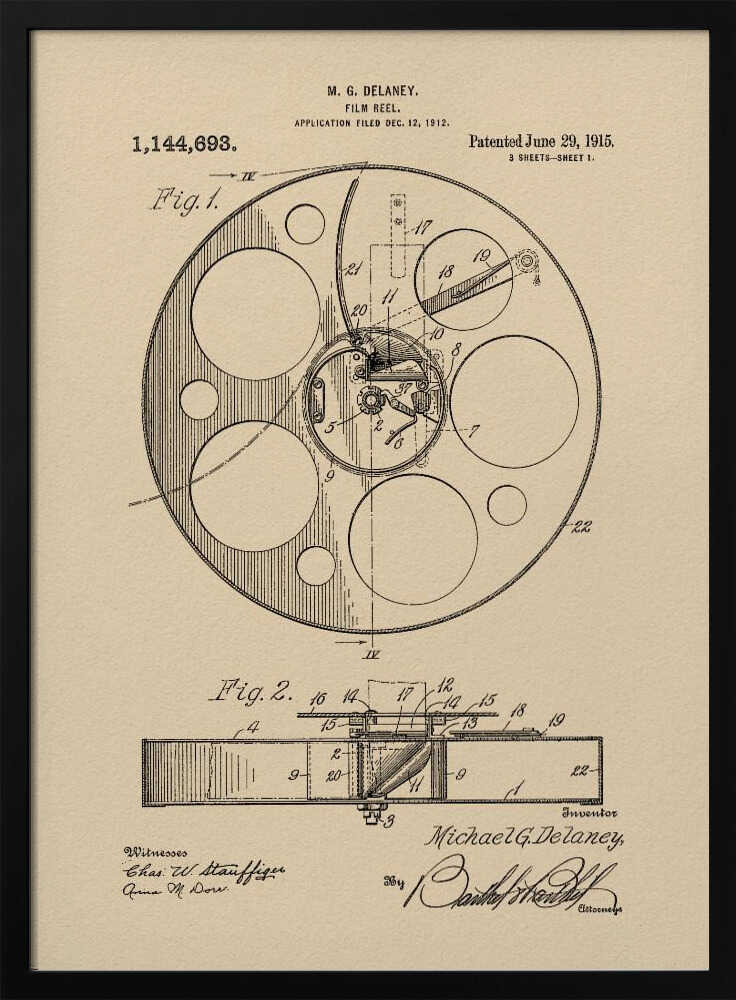 A framed vintage patent illustration of a film reel from 1915 by M.G. Delaney. The drawing is in black ink on a beige background, showing detailed schematics of the reel's mechanics from two different angles, complete with numbered parts, signatures, and patent information. Wall Art