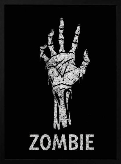 A black and white graphic of a distressed, skeletal zombie hand reaching up against a solid black background. Below the hand, the word 'ZOMBIE' is written in a bold, distressed font. The entire image is bordered by a thin black frame. Decor