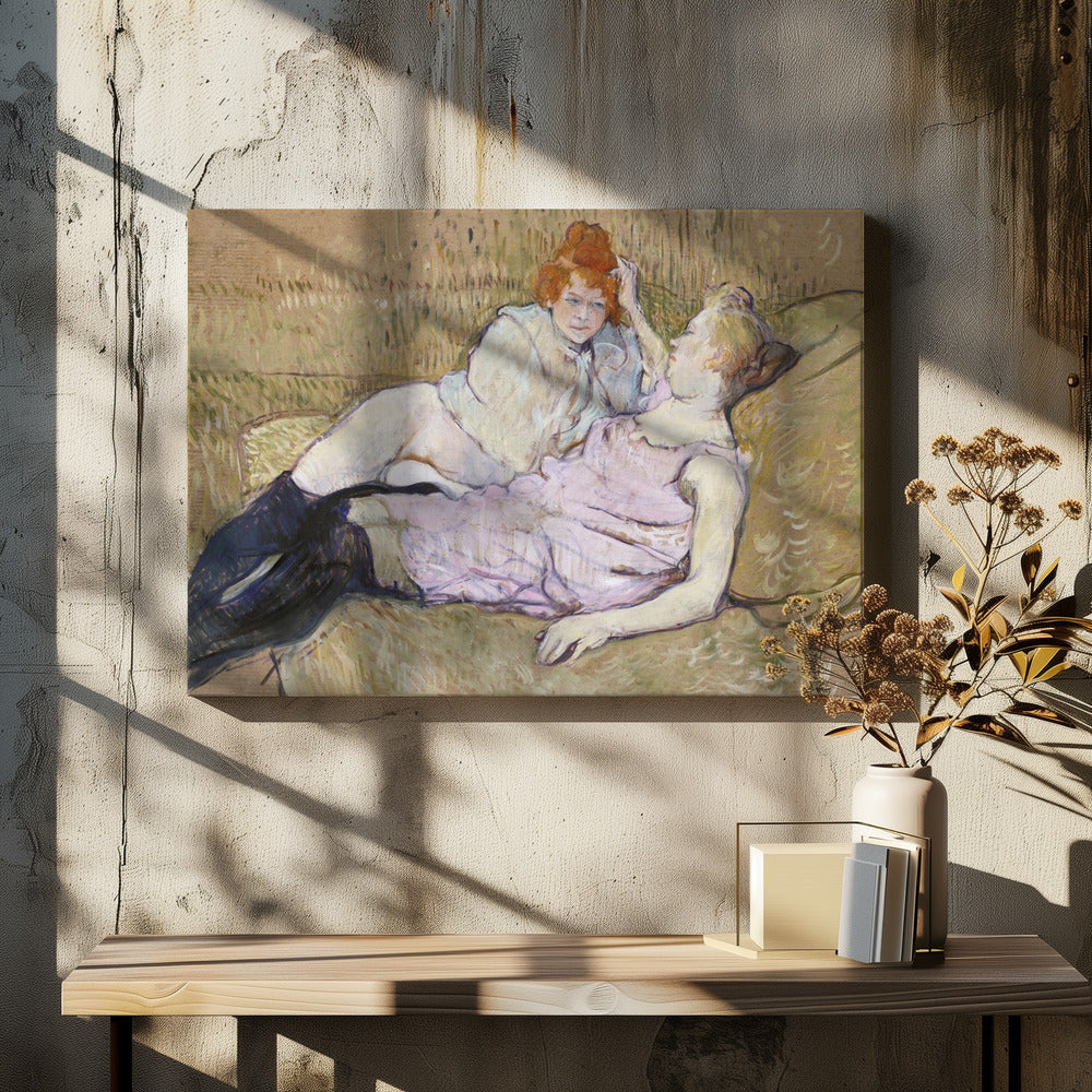 A Post-Impressionist painting by Henri de Toulouse-Lautrec titled 'The Sofa,' depicting two women lounging together on a greenish-tan couch. One woman with vibrant red hair, propped up on her elbow, looks down at her companion, who is lying back wearing a light pink dress and black stockings. The style is loose and painterly. Artwork