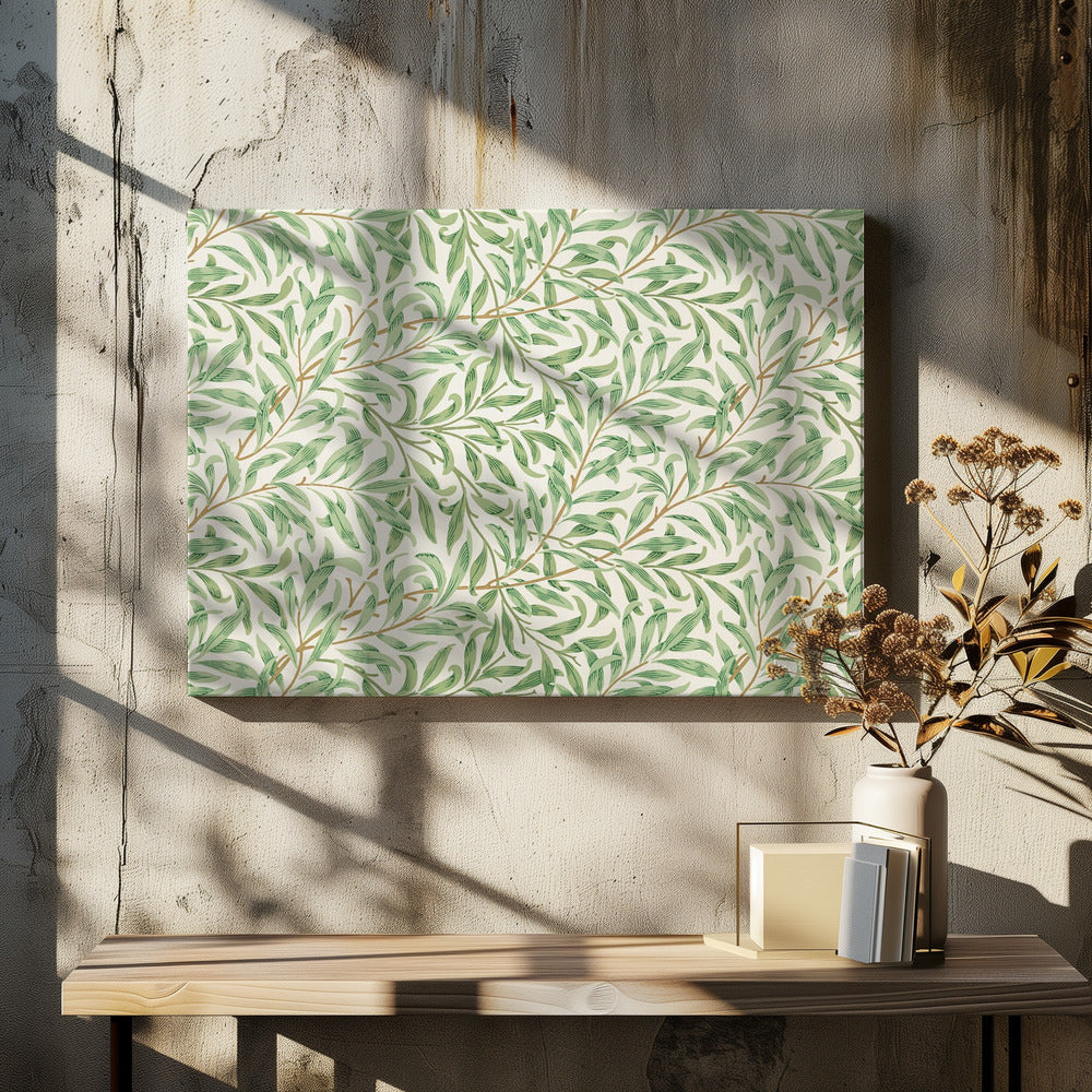 A classic William Morris 'Willow Boughs' pattern featuring intertwined green leaves and brown stems on a cream background, displayed within a simple brushed silver frame. Decor