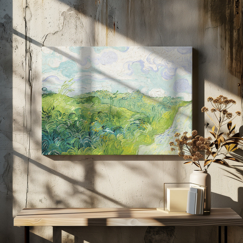 A framed art print of Vincent van Gogh's painting, 'Green Wheat Fields, Auvers'. It showcases a vibrant landscape of rolling green hills under a swirling blue and white sky, all rendered in his signature expressive, impasto brushwork. Print