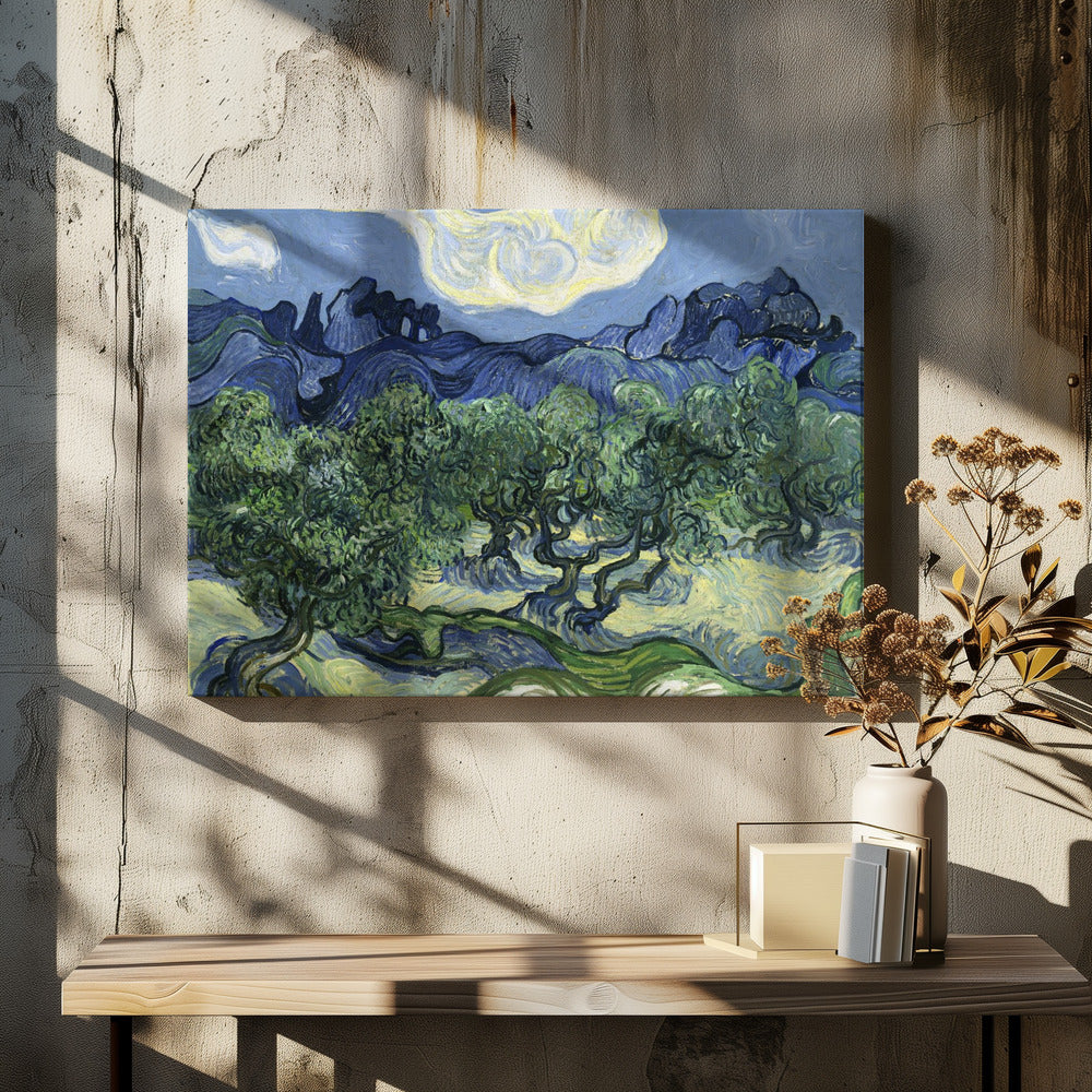 A framed post-impressionist painting by Vincent van Gogh depicting a vibrant landscape of gnarled green olive trees against a backdrop of rolling dark blue mountains under a swirling, stylized sky. Artwork