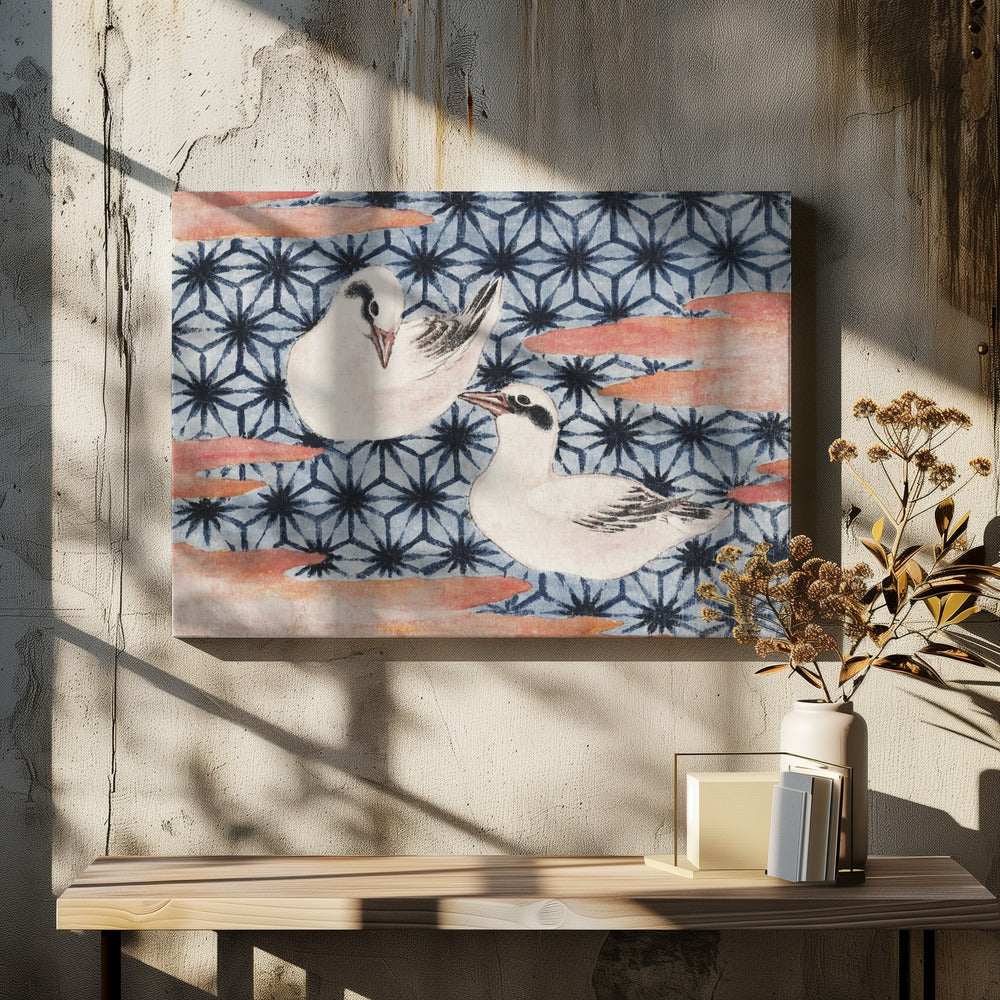 A vintage Japanese woodblock print featuring two white birds with black markings. The birds are set against a blue background with a dark blue Asanoha geometric pattern and reddish-pink, cloud-like shapes. The artwork is enclosed in a silver frame. Wall Art