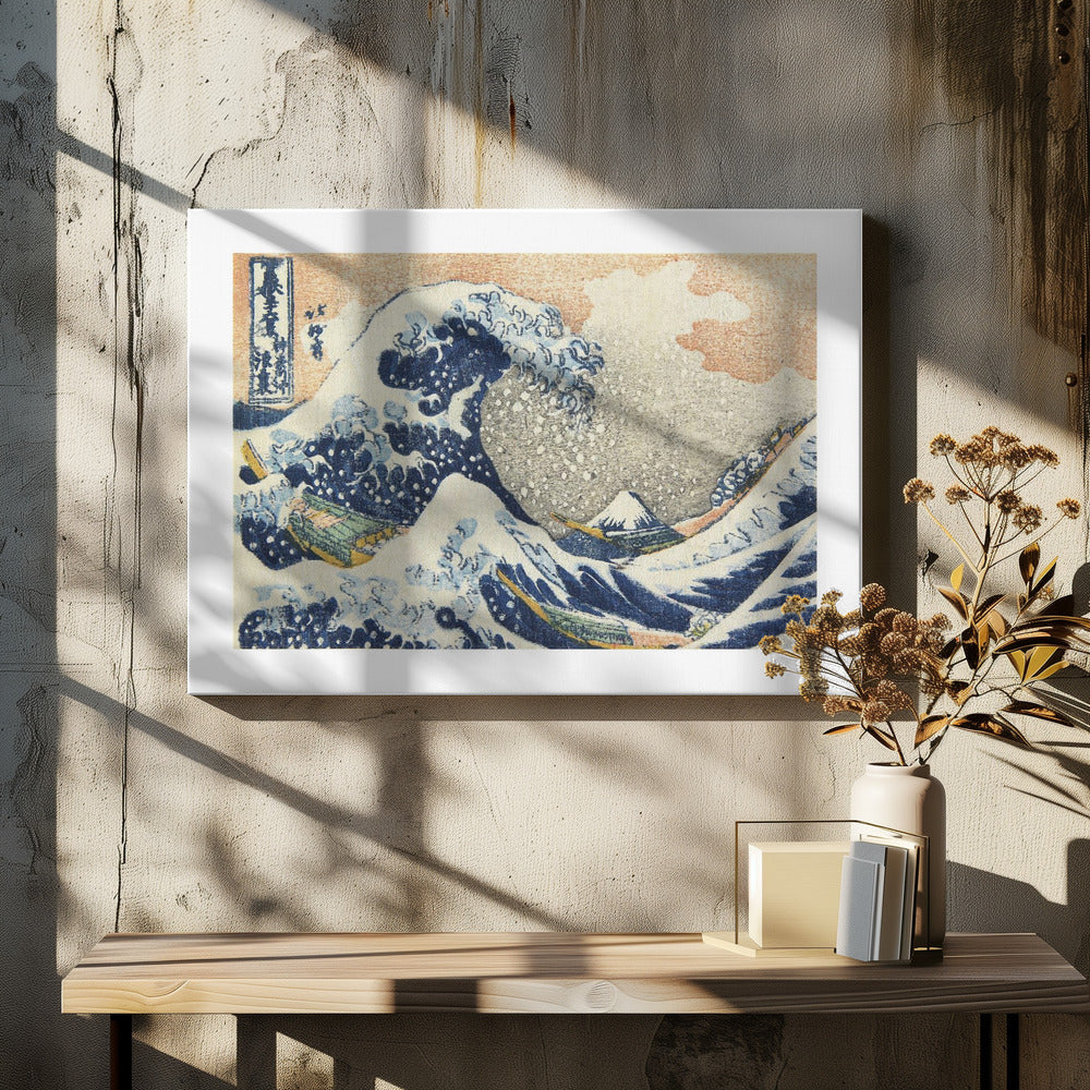 A framed print of Hokusai's 'The Great Wave off Kanagawa,' a Japanese ukiyo-e woodblock print. A huge, dark blue wave with white foam crests over small boats, with a snow-capped Mount Fuji in the distance under a pale orange sky. Artwork