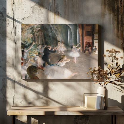 An impressionist painting depicting a ballet rehearsal on a stage. Ballerinas in white tutus practice and stretch while a male instructor in a dark suit directs them. The scene is viewed from the wings, with theatrical scenery in the background and onlookers seated to the right. Wall Art