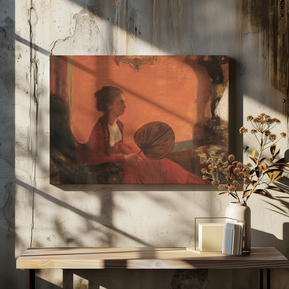 A vintage painting of a woman in profile sitting in a chair against a warm, orange-toned wall. She is wearing a red dress with a white ruffled collar and holding a dark, circular fan in her lap. The room is softly lit, with shadows and a small statue visible in the background. Wall Art