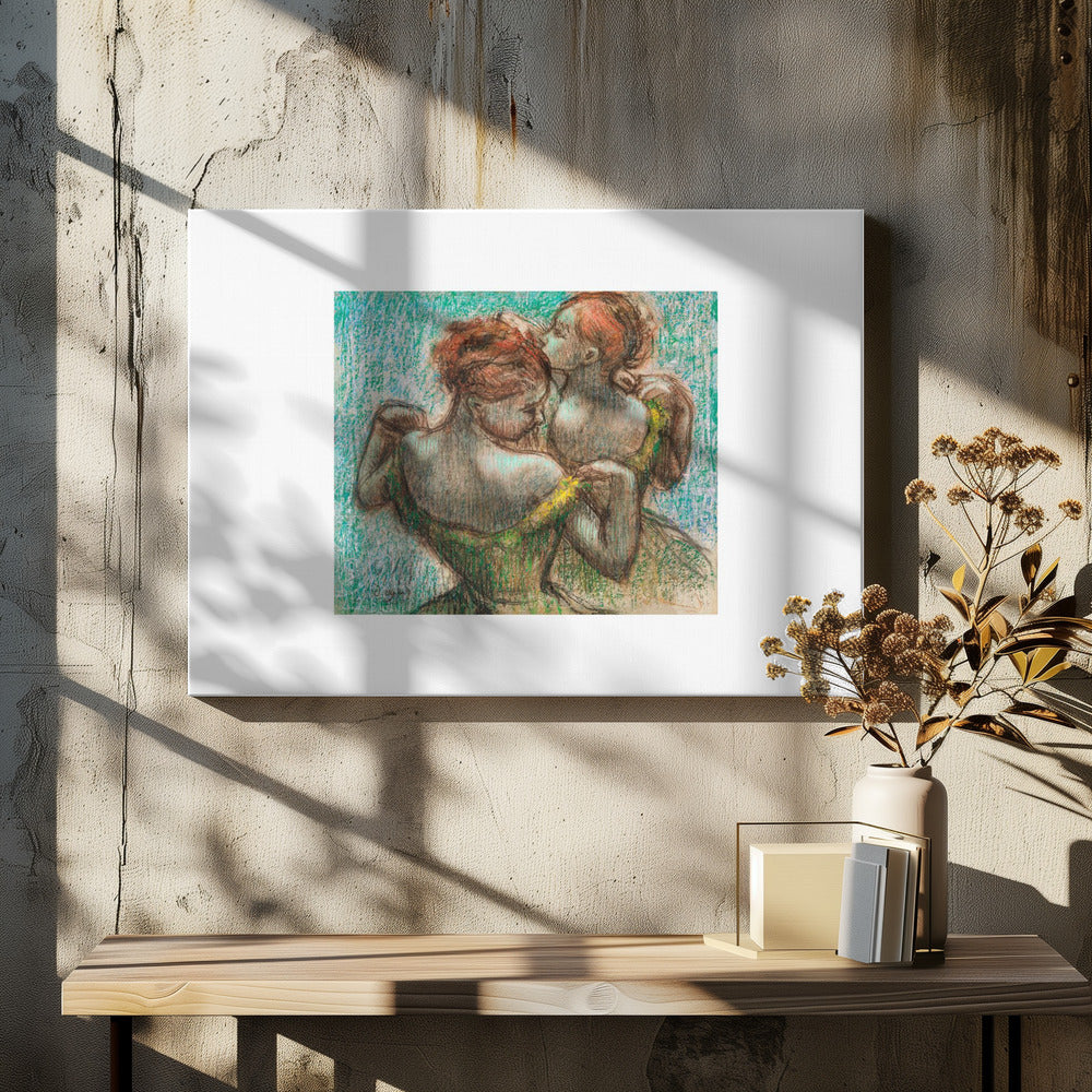 A framed pastel drawing by Edgar Degas, 'Two Dancers', depicting two ballerinas from behind. One dancer in a green dress with a yellow strap adjusts her costume, while another stands closely behind her against a textured turquoise background. The style is Impressionistic, capturing a candid moment. Artwork
