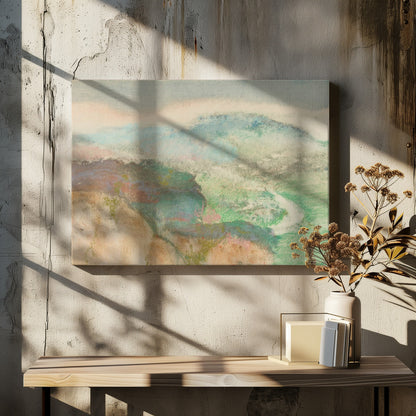 An abstract landscape painting in a silver frame, featuring soft, blended colors. Muted green and blue hills recede into a hazy, pale sky, while a winding white path cuts through a valley. The overall texture is soft and dreamlike. Decor