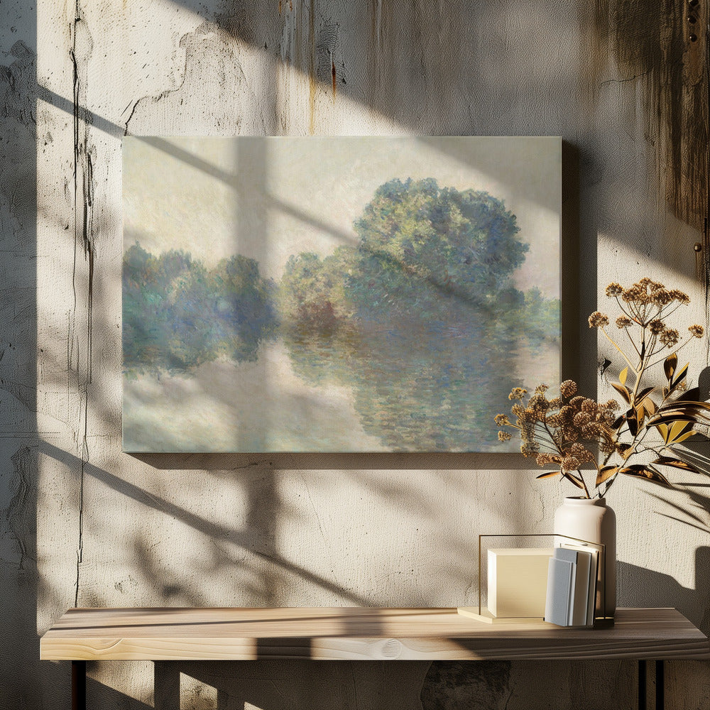 An impressionist painting of lush green trees on a riverbank, their forms blurred and reflected in the calm, hazy water below. The scene is rendered in soft, muted tones, creating a serene and atmospheric quality, and is presented in a simple silver frame. Artwork