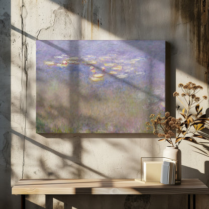 An impressionist painting by Claude Monet depicting water lilies floating on a pond, rendered in soft, blended strokes of purple, blue, green, and yellow. The artwork is displayed in a simple, silver-colored frame. Artwork
