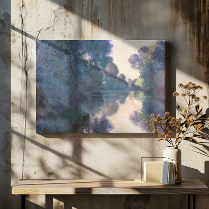 An Impressionist painting in a silver frame depicting a hazy river scene. Lush trees in shades of blue and purple line the banks, their forms and a patch of pale yellow sky softly reflected in the calm water. Artwork