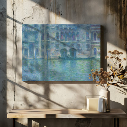 An Impressionist painting by Claude Monet titled 'The Palazzo Contarini,' depicting a grand Venetian building from across a canal. The artwork is characterized by hazy, blended brushstrokes in a cool palette of blues, greens, and purples, creating a misty and atmospheric effect on the water and architecture. A single gondola is moored near the building's entrance. The painting is displayed within a silver frame. Decor