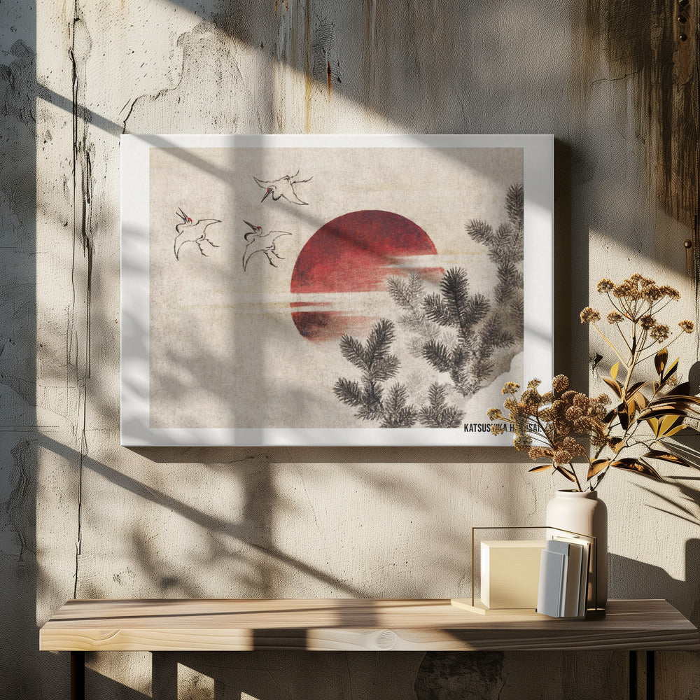 A vintage Japanese Ukiyo-e style painting by Katsushika Hokusai. The artwork features three cranes flying against a large, deep red sun on a textured beige background. In the foreground to the right, dark pine tree branches are depicted in black ink. Decor