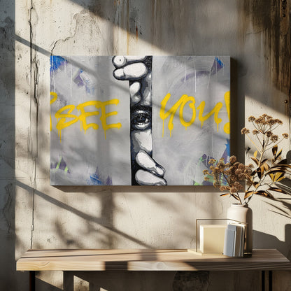 A framed modern art piece depicting a black and white eye peeking through a narrow vertical opening, with hands gripping the sides. The background is a textured gray with vibrant yellow graffiti-style text that reads 'I SEE YOU!' with paint drips. Print