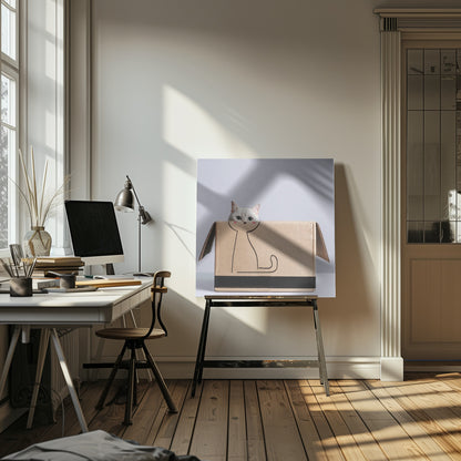 A cute white cat with green eyes peeks out of a cardboard box. The front of the box has a simple black line drawing of a cat's body, making it look as if the real cat's head belongs to the drawing. The image is set against a light gray background and enclosed in a light wood frame. Wall Art