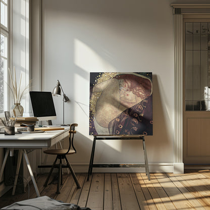 A print of Gustav Klimt's 1907 painting, 'Danaë'. The artwork depicts a sleeping, nude woman with vibrant red hair curled into a fetal position, receiving a shower of golden rain. The style is characteristic of Art Nouveau, with rich, decorative patterns on surrounding fabrics against a dark, star-like background, all within a light wood frame. Wall Art