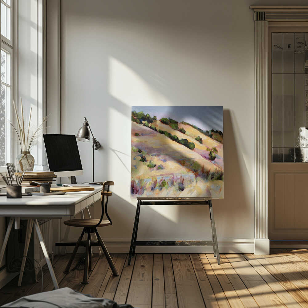An impressionist oil painting of golden, rolling hills dotted with green shrubs under a pale blue sky, framed in light wood.