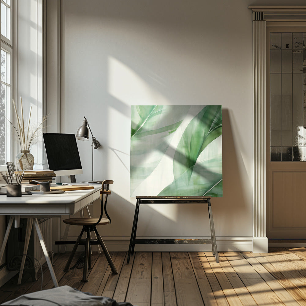 A light wood framed artwork depicting a close-up, abstract watercolor painting of large, overlapping tropical leaves. The shades of green are soft and translucent, creating a layered effect against a bright white background, evoking a sense of calm and nature. Print