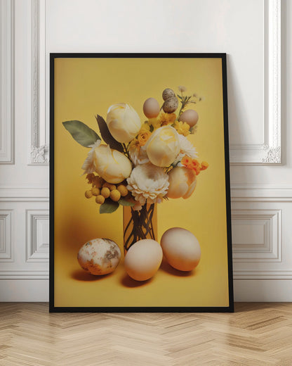 A still life composition featuring a bouquet of pale yellow and white flowers, including tulips and ranunculus, against a bright yellow background. Several plain and speckled eggs are artfully arranged within the bouquet and on the surface in front of the vase, creating a strong Easter or spring theme. Poster