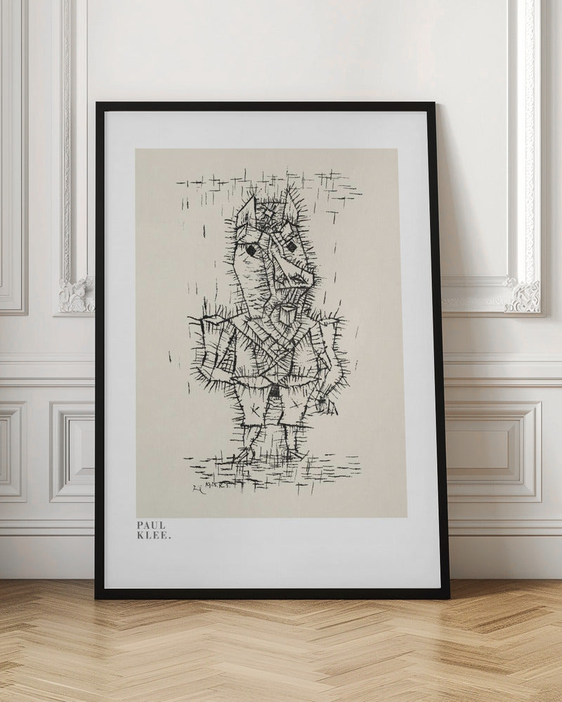 A framed art print of a Paul Klee drawing. The artwork features a stylized, abstract figure composed of short, spiky black ink lines on a light cream background, giving it a prickly texture. The figure stands against a sparse background with simple lines. The print is in a black frame, and the text 'PAUL KLEE.' is visible in the lower-left corner. Decor