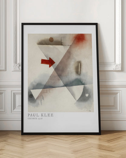 A framed print of Paul Klee's abstract painting 'Chimes 1928'. The artwork features overlapping geometric shapes in muted watercolor tones of gray and brown, with a prominent solid red arrow pointing to the right. Poster