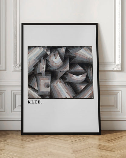 A framed art print of a Paul Klee abstract painting. The artwork is a complex composition of geometric shapes, including triangles, squares, and arcs, in a muted palette of grays, browns, and light blues. The name 'KLEE.' is printed in a black serif font on the white mat below the image. Decor