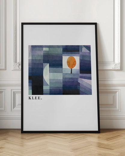 A framed art print of a Paul Klee painting featuring a geometric composition of rectangles in various shades of blue and purple. A single, stylized orange tree with a round top stands out against a white square. The artist's name, 'KLEE.', is printed in the lower left corner on the white mat. Decor