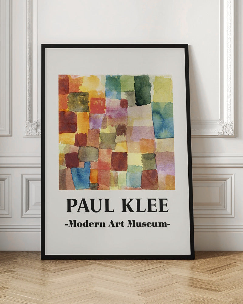 A framed museum poster for a Paul Klee exhibition at the Modern Art Museum. The poster features an abstract watercolor painting composed of a grid of colorful, overlapping squares and rectangles in shades of red, orange, yellow, green, and blue. Decor