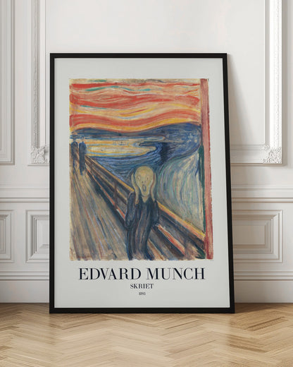 A framed poster of Edvard Munch's iconic 1893 painting 'The Scream' (Skriet). It depicts a figure with a look of anguish, hands clapped to its head, against a backdrop of a fiery, swirling orange and red sky over a dark blue fjord. The text 'EDVARD MUNCH', 'SKRIET', and '1893' is printed below the artwork. Poster