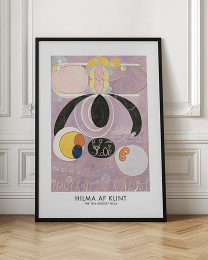 A framed art print of Hilma af Klint's abstract painting 'The Ten Largest No. 6'. The artwork features a complex composition of geometric and organic shapes, including large black forms, pink and white concentric circles, and yellow and blue patterns, all set against a light purple background with stylized text. Poster