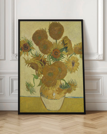 A framed reproduction of Vincent van Gogh's famous 'Sunflowers' painting. It depicts a rustic earthenware vase filled with a bouquet of sunflowers in various stages of life, from full bloom to wilting. The painting is characterized by its vibrant yellow and brown tones and thick, expressive brushstrokes, signature to the post-impressionist style. The artist's name, 'Vincent', is signed on the vase. Decor