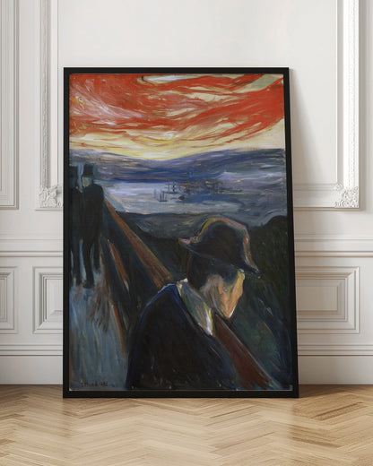 An expressionist painting by Edvard Munch titled 'Despair,' showing a man in a dark hat and coat from behind, leaning on a railing of a bridge under a turbulent red and orange sky. In the background, two other figures walk away, and a somber blue landscape with a fjord is visible. Poster