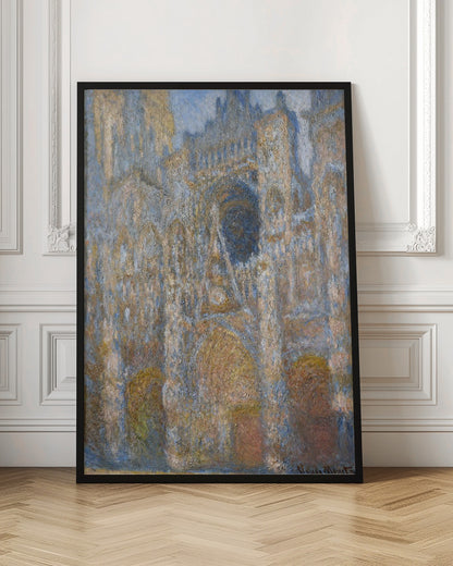 An impressionist painting depicting the facade of a grand cathedral. The artwork is characterized by its textured brushstrokes and a muted color palette of blues, golds, and tans, capturing the interplay of light and shadow on the stone architecture. The painting is set within a simple black frame. Artwork