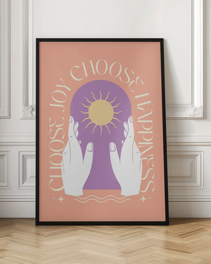 An inspirational art print featuring a peach background and a central design. Two white hands hold a purple archway that frames a yellow sun. The words 'Choose Joy' and 'Choose Happiness' curve around the central image in a tan font. Wall Art