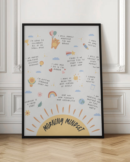 An inspirational poster in a black frame titled 'Morning Mindset' featuring a large yellow sun at the bottom. The poster is filled with positive affirmations in a handwritten font, each accompanied by a small, cute illustration like a bear with balloons, a rainbow, a trophy, and a sunflower. Wall Art