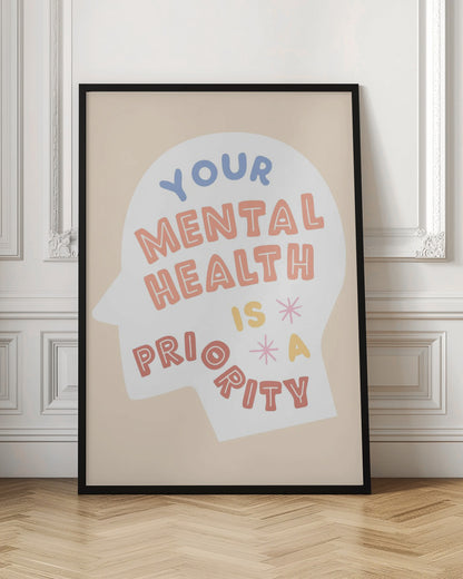 An inspirational art print with a beige background featuring a white silhouette of a head. Inside the silhouette, the phrase 'Your mental health is a priority' is written in a playful, multi-colored block font. Wall Art