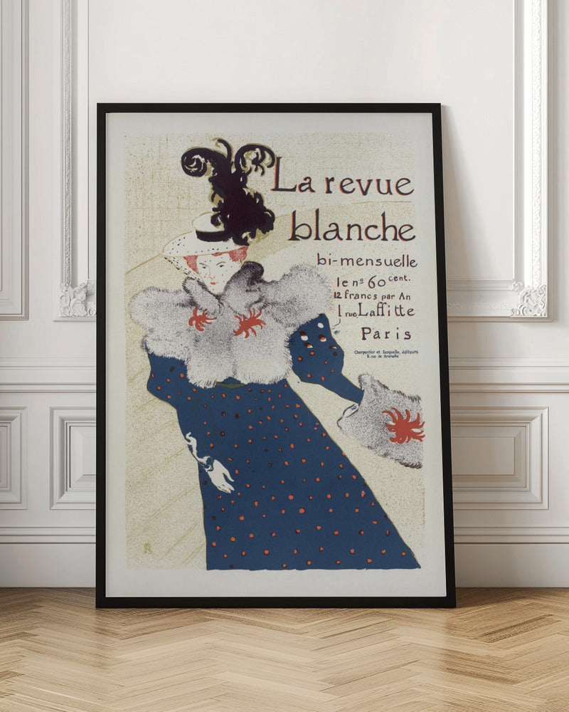 A vintage French poster for 'La revue blanche' by Toulouse-Lautrec. The Art Nouveau illustration features a stylish woman in a blue dress with red polka dots, a large grey fur stole, and a white hat with a prominent black feather plume against a cream background with text. Print
