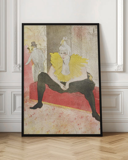 A vintage artwork by Henri de Toulouse-Lautrec featuring a female clown, Mademoiselle Cha-u-kao, seated on a red bench. She wears a vibrant yellow ruffled collar and black leggings, with a pensive expression on her face. The background depicts a bustling cabaret scene. Artwork