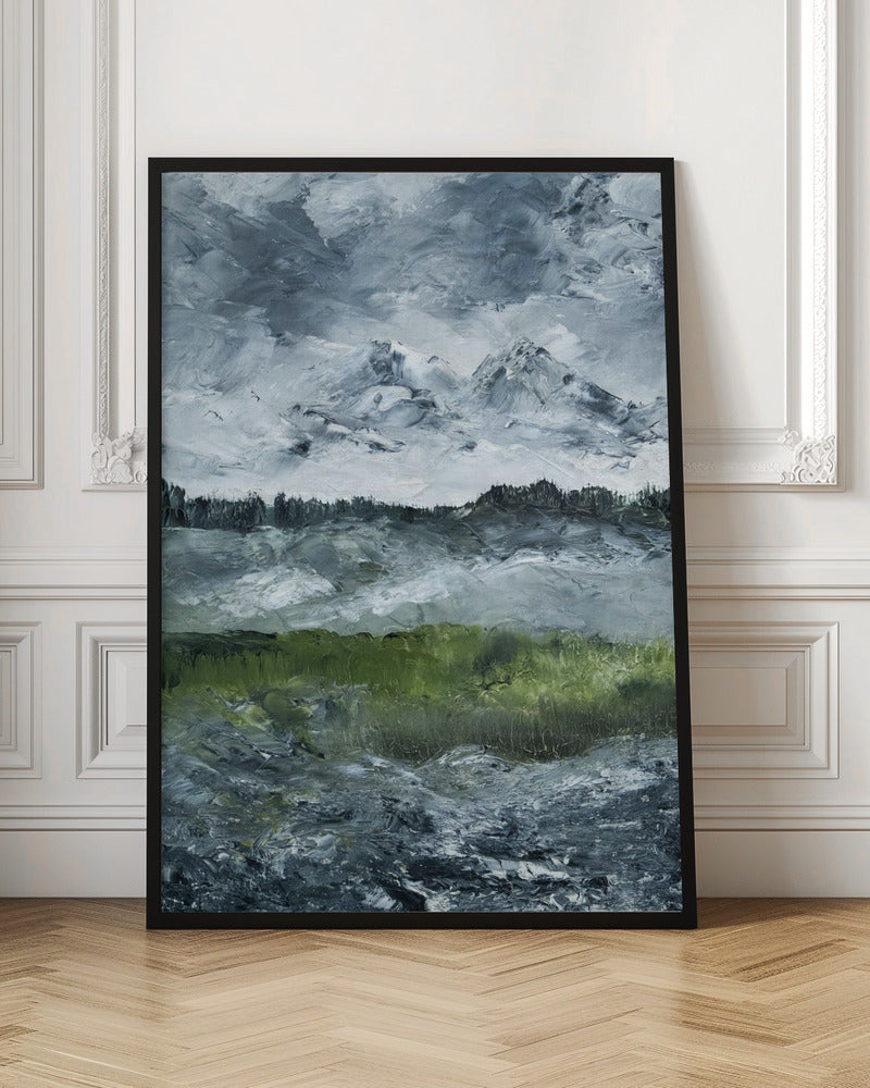 A heavily textured impasto painting of a dramatic mountain landscape under a stormy grey and white sky. Snow-capped peaks rise in the distance above a dark treeline, while a vibrant green field in the foreground provides a splash of color against the otherwise moody, cool-toned scene. The artwork is presented in a simple black frame. Wall Art