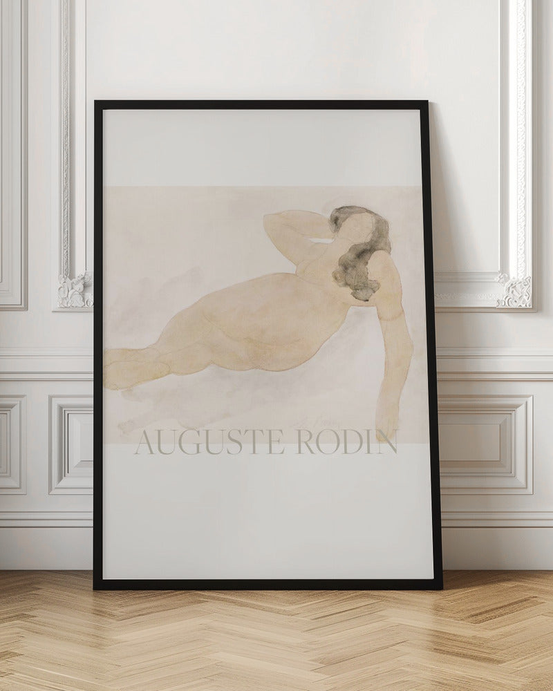 A framed watercolor painting by Auguste Rodin of a reclining nude woman. The figure is rendered in soft flesh tones and graphite with dark hair, set against a pale cream and beige background. The artist's name is printed in light text at the bottom. Poster