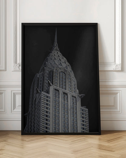A dramatic, low-angle, black and white photograph of the top of the Chrysler Building, showcasing its iconic Art Deco spire and architectural details against a solid black background. Decor