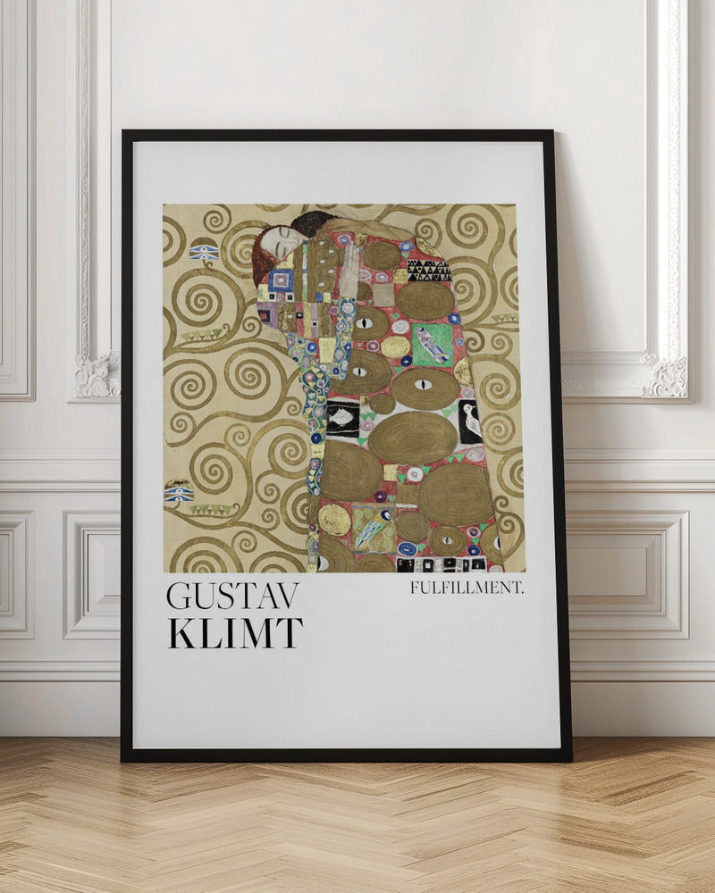 A framed poster of Gustav Klimt's painting 'Fulfillment'. It features a stylized man and woman embracing, wrapped in ornate, mosaic-like robes against a background of golden swirls. Below the image is the text 'GUSTAV KLIMT' and 'FULFILLMENT.'. Wall Art