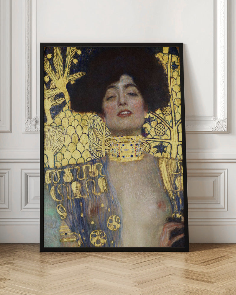 A vertical portrait painting by Gustav Klimt, 'Judith and the Head of Holofernes,' depicting a woman with voluminous dark hair and a sensual expression. She wears an elaborate gold and bejeweled choker, with a decorated blue and gold garment falling from her shoulders against a richly patterned gold leaf background. Artwork