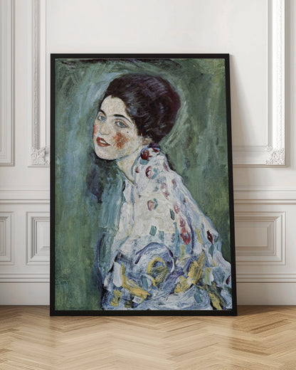 An expressionist portrait painting of a woman with dark hair, blue eyes, and red lipstick, looking back over her shoulder. She wears a patterned dress against a textured green and blue background. The artwork has visible, thick brushstrokes. Artwork