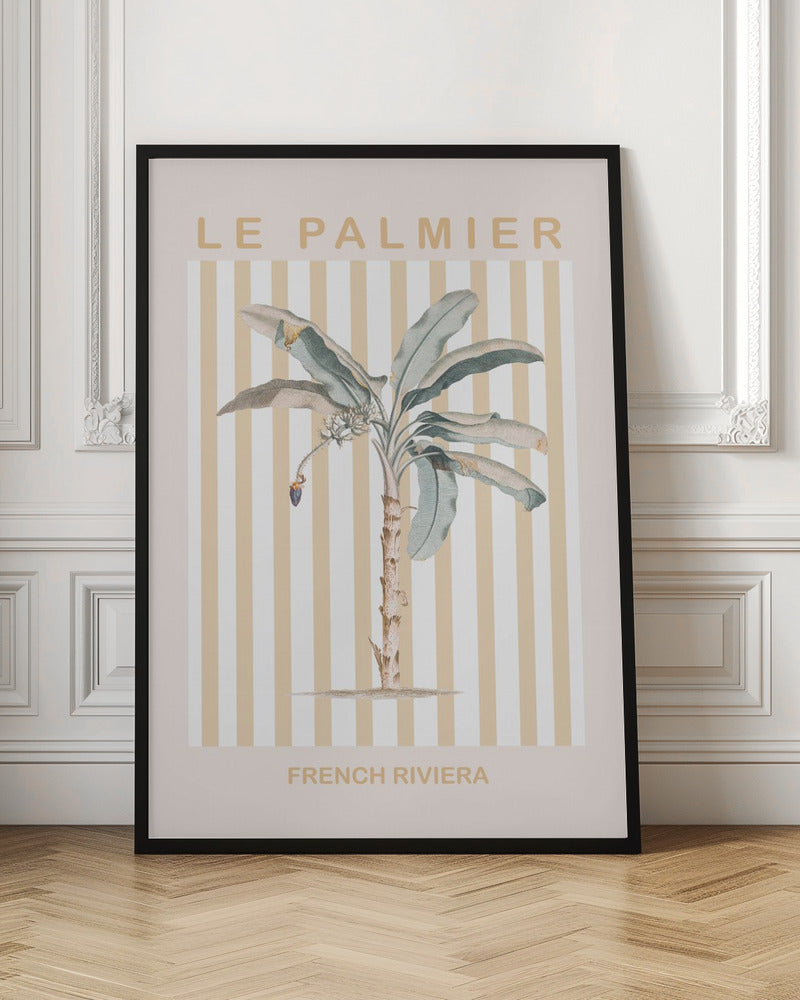 A vintage-style poster in a black frame featuring a botanical illustration of a palm tree. The background has vertical stripes in beige and white. The text 'LE PALMIER' is at the top, and 'FRENCH RIVIERA' is at the bottom in a sandy beige color. Decor
