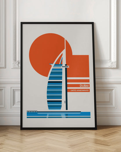 A minimalist travel poster of Dubai, featuring a stylized illustration of the Burj Al Arab hotel in shades of blue. A large orange circle, representing the sun, is in the background. The text 'DUBAI' and 'UNITED ARAB EMIRATES' is printed in white on orange bars to the right. The artwork is presented in a black frame. Artwork