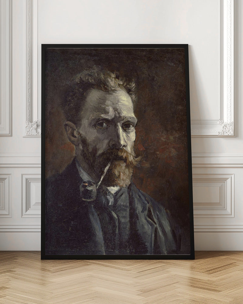 A framed, dark, and moody oil painting of Vincent van Gogh's self-portrait. He looks directly at the viewer with an intense expression, a pipe held in his mouth. He has a reddish beard and mustache and is wearing a dark suit against a dark brown, textured background. Decor